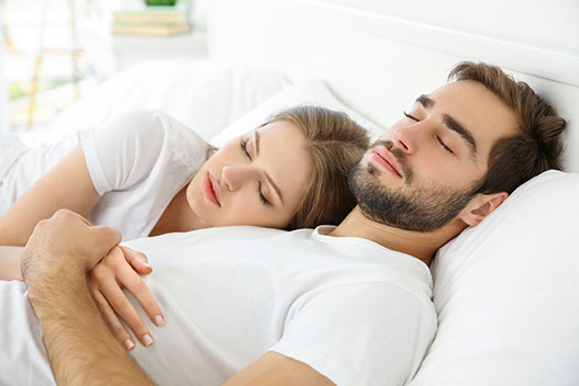 couple sleeps in our mattress